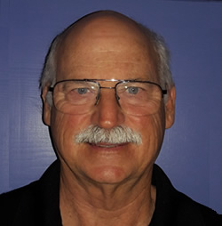 Headshot of Board President Greg Youchock